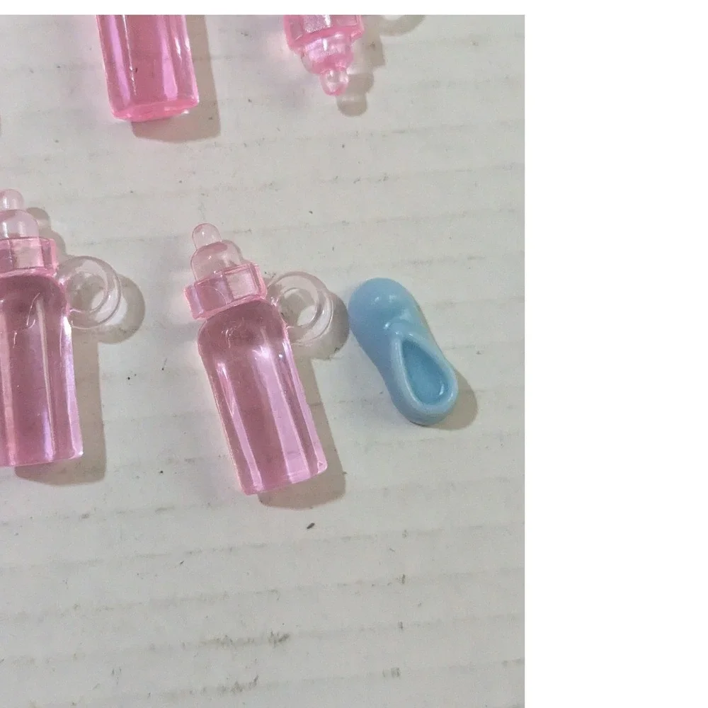 36pc Miniature Baby Shower Favors Pink Plastic Bottles and Blue Booties Set